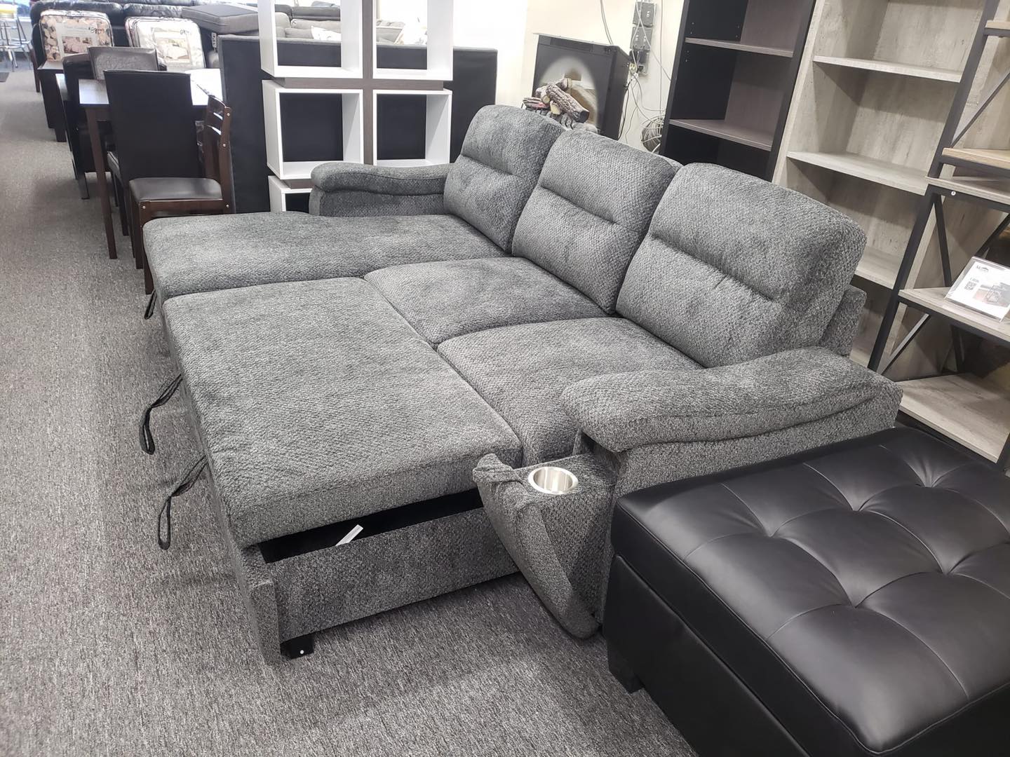 Barstow - Sofa Pull Out Bed with 2 Hidden Cupholders and Reversible Storage Chaise in Charcoal