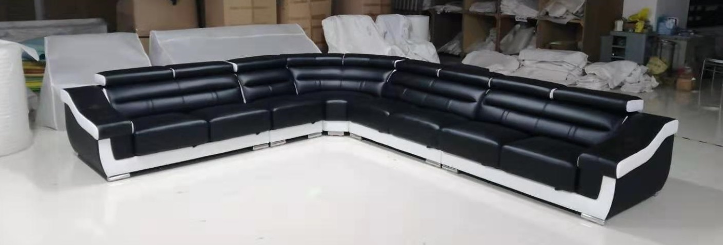 LEONA MICROFIBRE LEATHER MATCH SECTIONAL IN BLACK AND WHITE