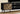 I 2781 - TV STAND - 72"L / BLACK WITH 2 WOOD-LOOK DOORS BY MONARCH SPECIALTIES INC