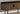 I 2798 - TV STAND - 72"L / BLACK WITH 4 BROWN WOOD-LOOK DOORS