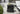 I 4117 - ACCENT TABLE - 25"H / BLACK INDOOR OR OUTDOOR