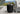 I 4150 - ACCENT TABLE - 25"H / BLACK INDOOR OR OUTDOOR